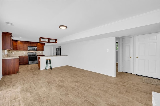 4331 E Kings Point Cir, Dunwoody, GA 30338 - unfurnished living room with a sink and light wood finished floors