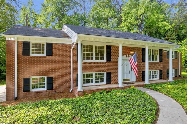 4331 E Kings Point Cir, Dunwoody, GA 30338 - view of front facade featuring brick siding