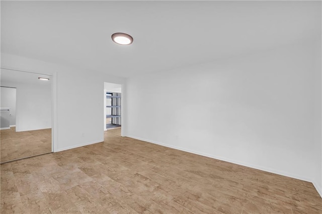 4331 E Kings Point Cir, Dunwoody, GA 30338 - empty room featuring baseboards and wood finished floors