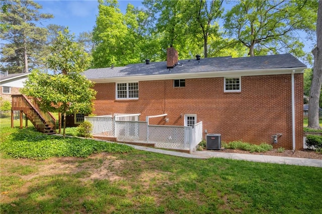4331 E Kings Point Cir, Dunwoody, GA 30338 - rear view of property with stairway, a yard, a chimney, and a deck