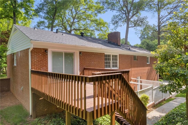4331 E Kings Point Cir, Dunwoody, GA 30338 - back of property featuring brick siding, a chimney, and a wooden deck