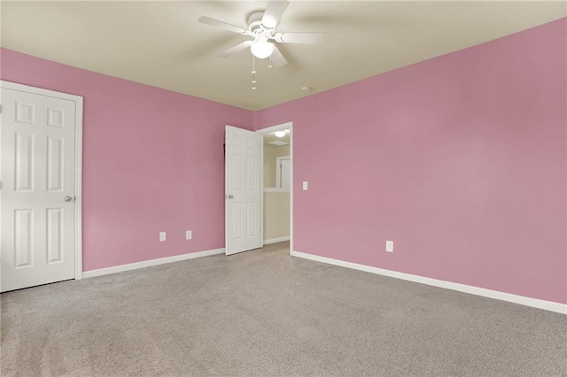 unfurnished bedroom with carpet flooring and ceiling fan