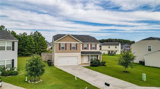 view of front of house with a front lawn and a garage