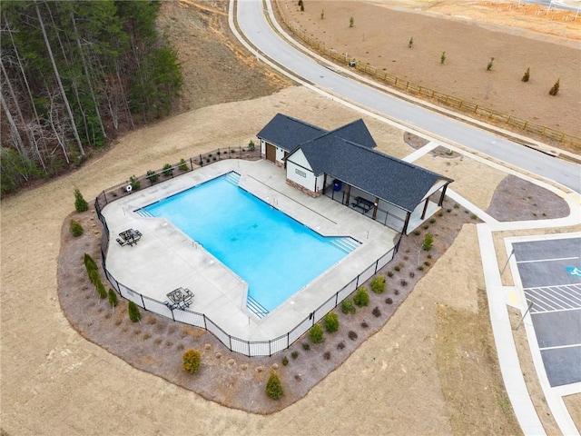 community pool with fence