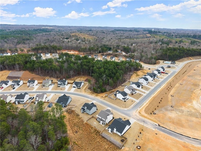 bird's eye view with a view of trees