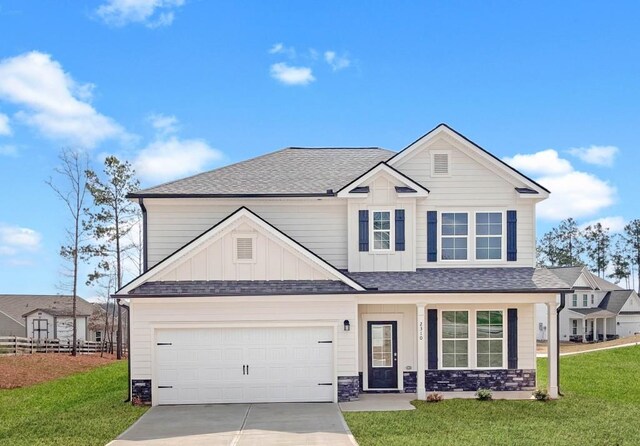 craftsman-style house with a porch and a garage