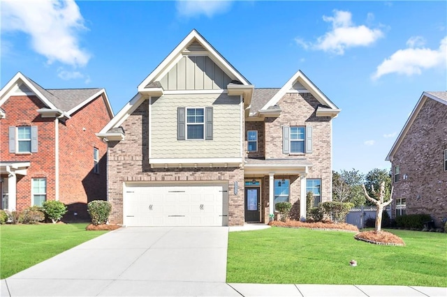 craftsman-style house featuring a front yard and a garage