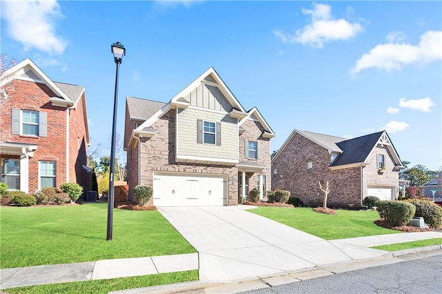 view of front of property featuring a front yard and a garage