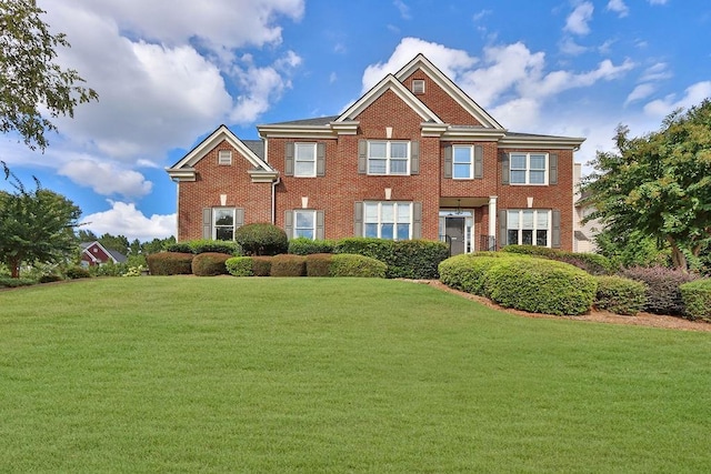 view of front of property with a front lawn