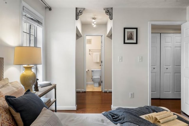 3701 Essex Ave Unit 2, Atlanta, GA 30339 - bedroom with a closet, wood finished floors, and baseboards
