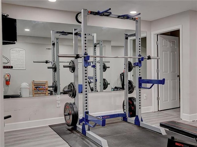3701 Essex Ave Unit 2, Atlanta, GA 30339 - exercise room featuring baseboards, wood finished floors, and recessed lighting