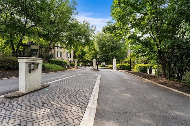 3701 Essex Ave Unit 2, Atlanta, GA 30339 - view of asphalt street with a gated entry and curbs