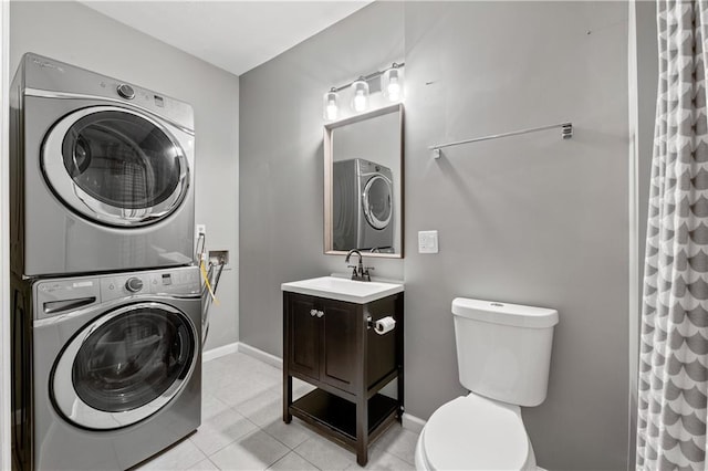 2680 Pine Tree Rd NE Unit 2, Atlanta, GA 30324 - bathroom featuring estacked washer and dryer, vanity, tile patterned flooring, and a shower with curtain