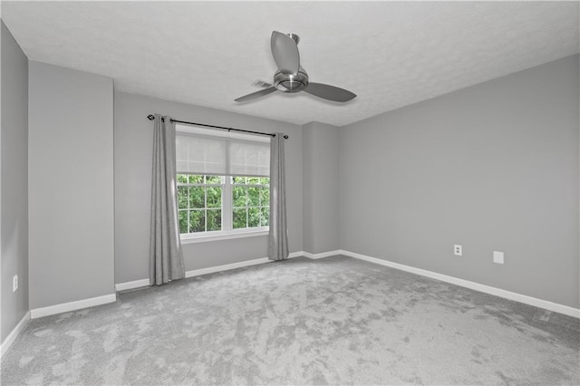 2680 Pine Tree Rd NE Unit 2, Atlanta, GA 30324 - spare room with carpet floors, a ceiling fan, and a textured ceiling