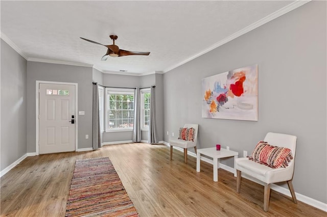 2680 Pine Tree Rd NE Unit 2, Atlanta, GA 30324 - entrance foyer with wood finished floors, a ceiling fan, and crown molding