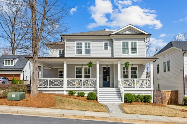 view of front of property featuring covered porch