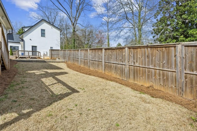 view of yard with a deck