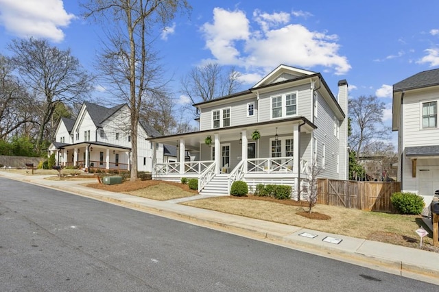 view of front of home featuring a garage and covered porch