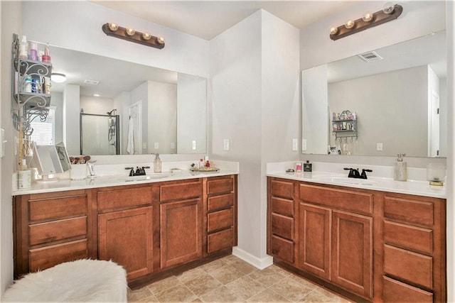1329 Old Glory Ct, Hoschton, GA 30548 - full bathroom featuring two vanities and a stall shower