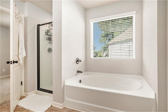 1329 Old Glory Ct, Hoschton, GA 30548 - bathroom featuring a garden tub and a stall shower