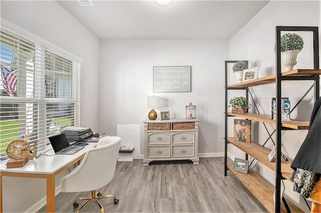 1329 Old Glory Ct, Hoschton, GA 30548 - office area featuring healthy amount of natural light and wood finished floors