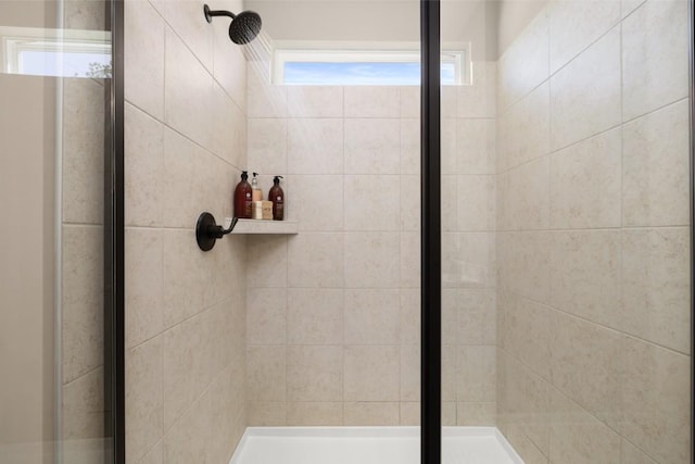 bathroom featuring an enclosed shower