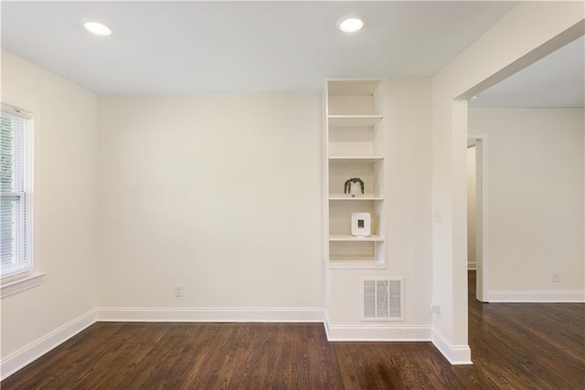 interior space with dark hardwood / wood-style floors