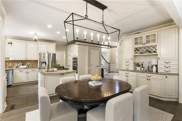 dining room featuring recessed lighting, visible vents, stairway, dark wood-style floors, and crown molding