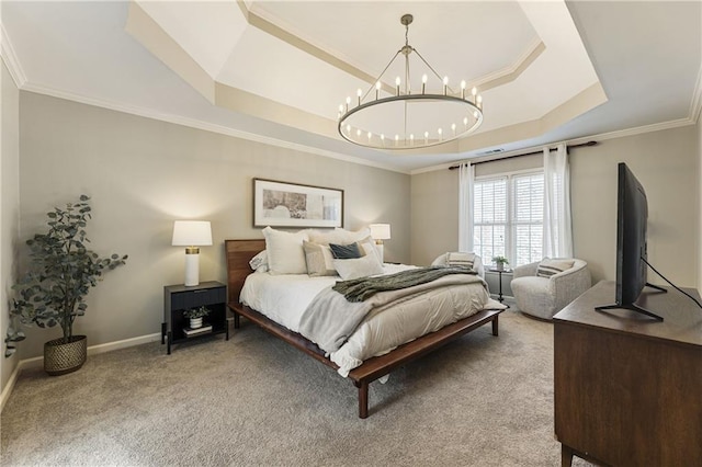 bedroom featuring baseboards, a raised ceiling, crown molding, carpet flooring, and a chandelier