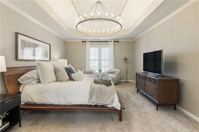 bedroom with a notable chandelier, light carpet, baseboards, a tray ceiling, and crown molding