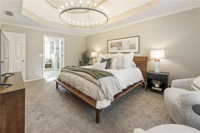 carpeted bedroom with a tray ceiling, a notable chandelier, visible vents, ornamental molding, and baseboards