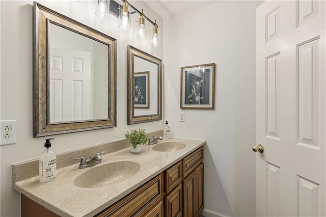 bathroom with double vanity and a sink