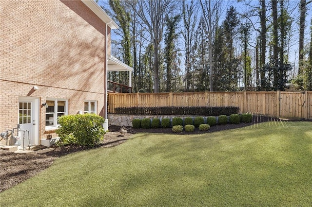 view of yard featuring fence