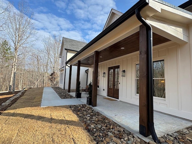526 Spring Place Rd NE, White, GA 30184 - property entrance featuring board and batten siding and french doors
