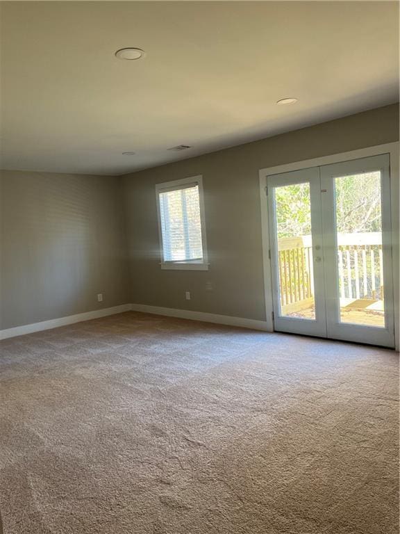 view of carpeted spare room