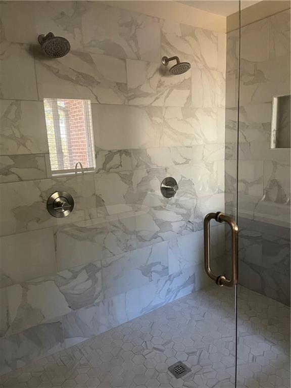 bathroom with walk in shower