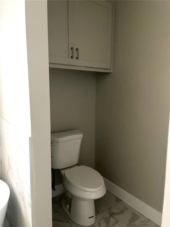 bathroom featuring toilet