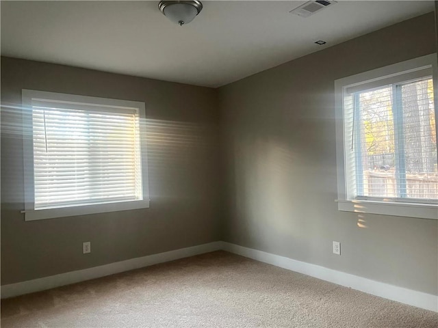 view of carpeted spare room