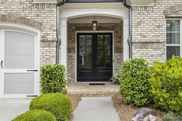 11375 Crestview Ter, Johns Creek, GA 30024 - entrance to property featuring french doors and brick siding