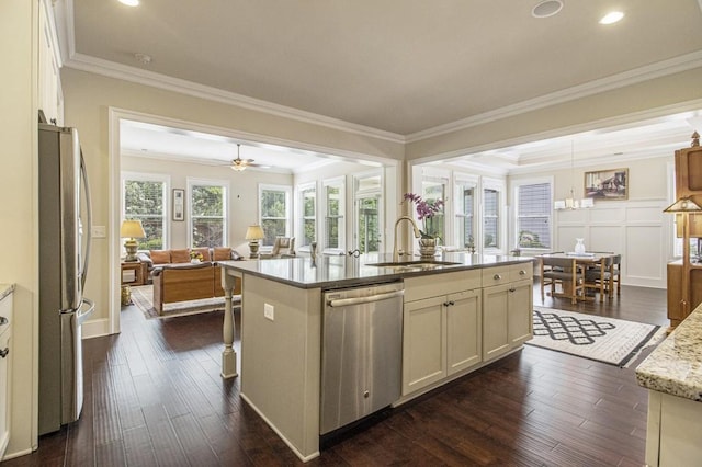 11375 Crestview Ter, Johns Creek, GA 30024 - kitchen featuring appliances with stainless steel finishes, a sink, open floor plan, a center island with sink, and recessed lighting