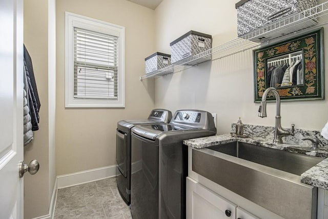 11375 Crestview Ter, Johns Creek, GA 30024 - washroom featuring baseboards and independent washer and dryer