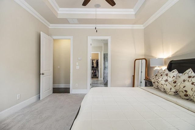 11375 Crestview Ter, Johns Creek, GA 30024 - carpeted bedroom with a tray ceiling, crown molding, a ceiling fan, and baseboards