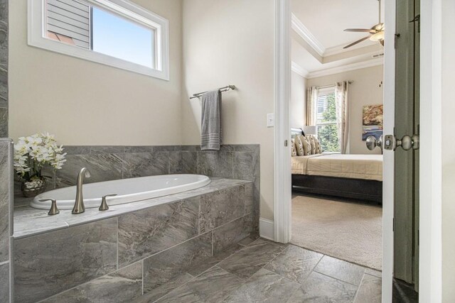 11375 Crestview Ter, Johns Creek, GA 30024 - ensuite bathroom featuring crown molding, a garden tub, ceiling fan, baseboards, and marble finish flooring
