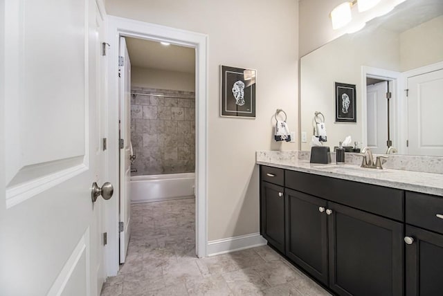 11375 Crestview Ter, Johns Creek, GA 30024 - bathroom featuring vanity, baseboards, and shower / bathtub combination
