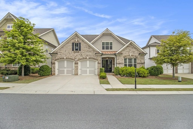 11375 Crestview Ter, Johns Creek, GA 30024 - craftsman-style home with driveway, brick siding, and an attached garage