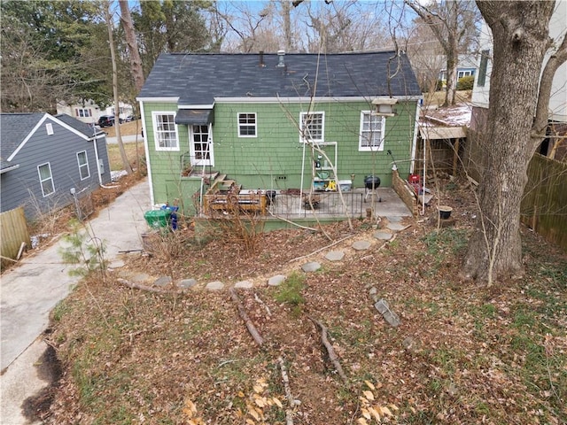 back of property with a patio area