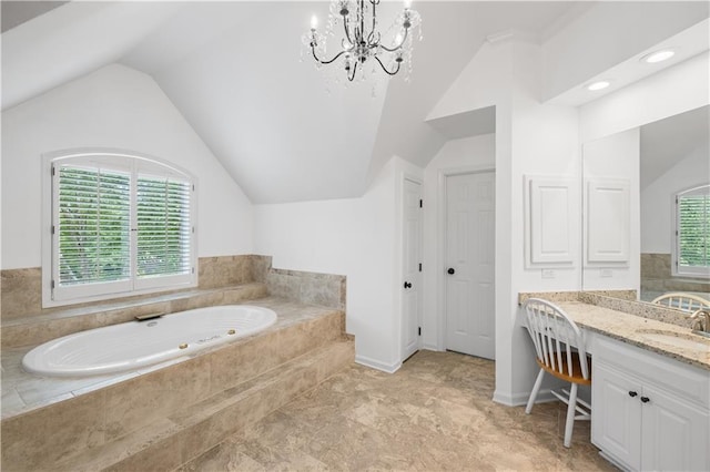 1045 River Pt, Suwanee, GA 30024 - full bathroom featuring a bath, plenty of natural light, lofted ceiling, a chandelier, and vanity