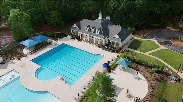 1045 River Pt, Suwanee, GA 30024 - community pool featuring a patio area