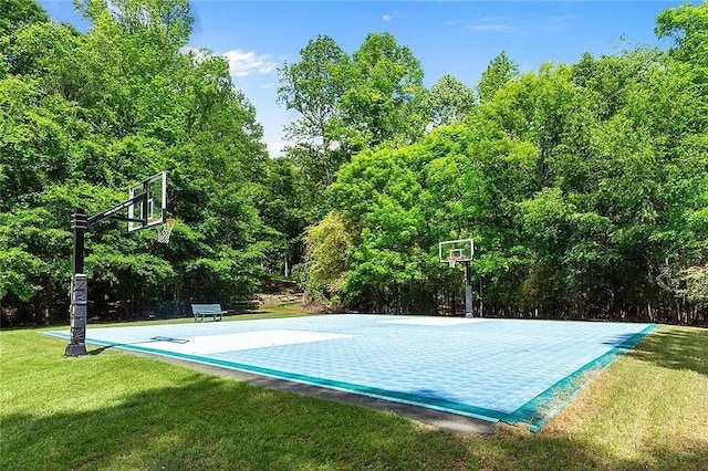 1045 River Pt, Suwanee, GA 30024 - view of sport court with a lawn and basketball hoop