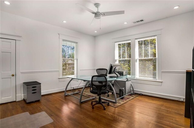 office area featuring ceiling fan and dark hardwood / wood-style floors